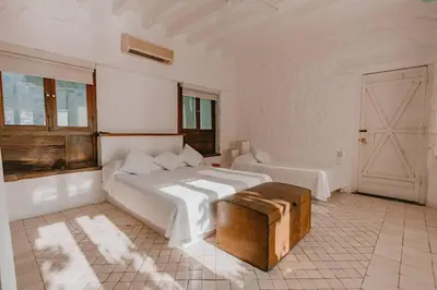 Cama o camas de una habitación en Casa de Piedra