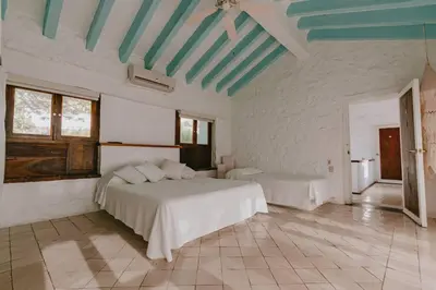 Cama o camas de una habitación en Casa de Piedra