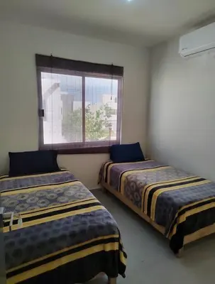 Cama o camas de una habitación en Cómoda casa en clúster privado