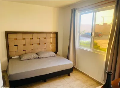Cama o camas de una habitación en Casa Sauces Sur, alberca, billar, roof garden privado