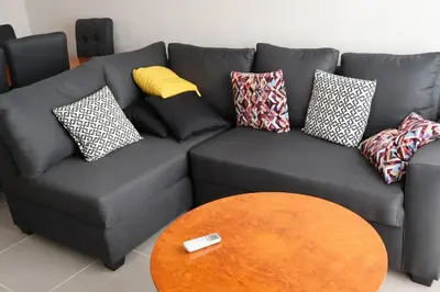 Zona de estar de casa con club de playa