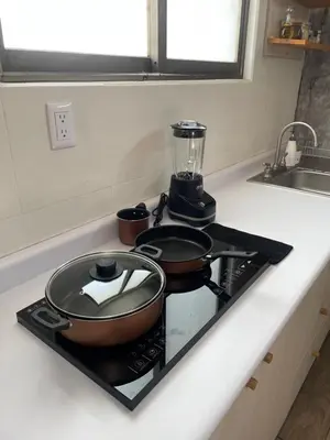 Una cocina o zona de cocina en Departamento Blausee