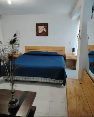 Cama o camas de una habitación en Buen lugar para descansar