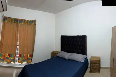 Cama o camas de una habitación en Departamento tiempo de relax