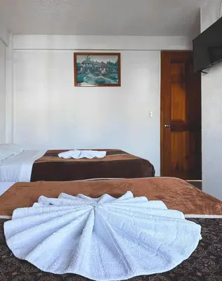 Cama o camas de una habitación en Hotel Juquila Nochixtlán