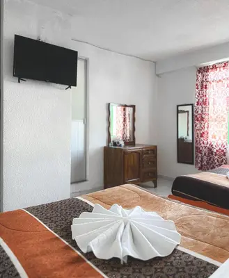 Una televisión o centro de entretenimiento en Hotel Juquila Nochixtlán