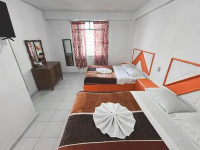 Cama o camas de una habitación en Hotel Juquila Nochixtlán
