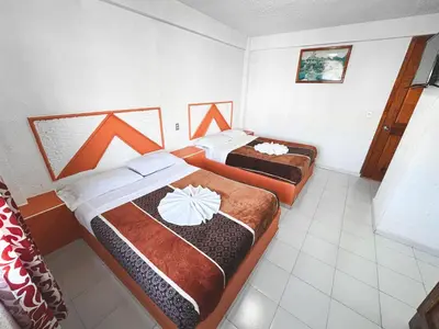 Cama o camas de una habitación en Hotel Juquila Nochixtlán