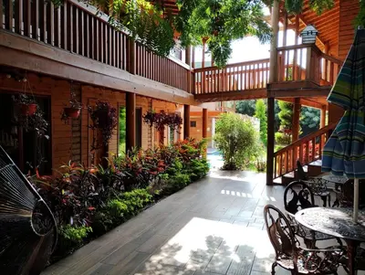 Jardín al aire libre en Hotel Cabaña iilldaa