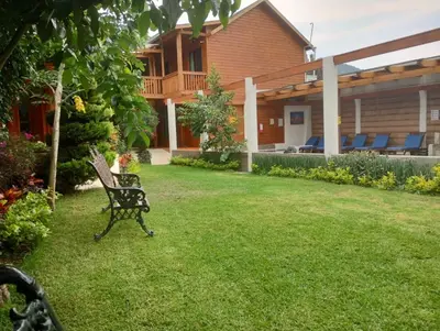 Jardín al aire libre en Hotel Cabaña iilldaa