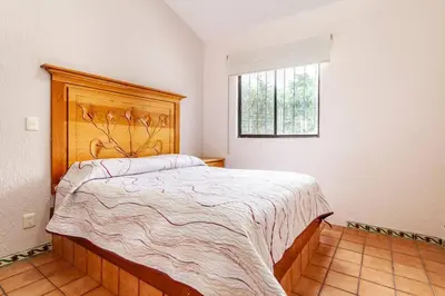 Cama o camas de una habitación en Casa de descanso con alberca en burgos Cuernavaca