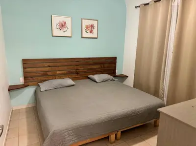 Cama o camas de una habitación en Departamento de las flores