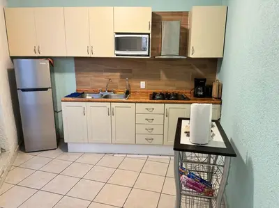Una cocina o zona de cocina en Departamento de las flores