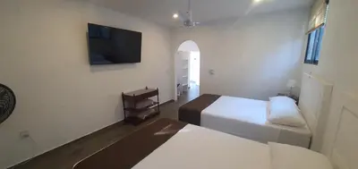 Cama o camas de una habitación en Hotel Casa Piñón