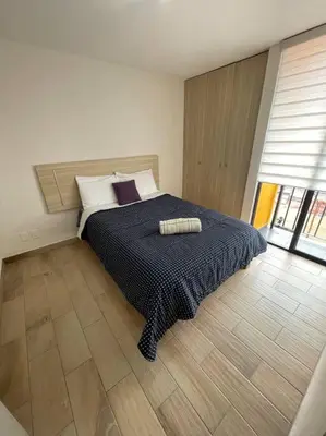 Cama o camas de una habitación en Departamento cerca Palacio Deportes, Estadio GNP, Aeropuerto AICM, Autódromo