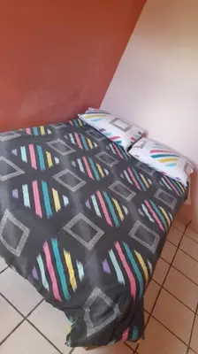 Cama o camas de una habitación en Lugar encantador en San Jacinto Amilpas
