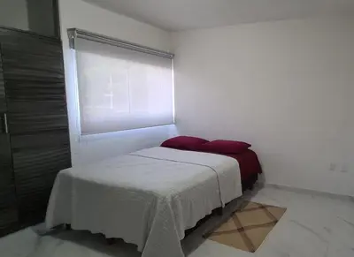 Cama o camas de una habitación en Departamento Moderno y Cómodo