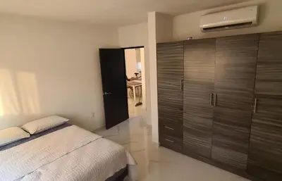 Cama o camas de una habitación en Departamento Moderno y Cómodo