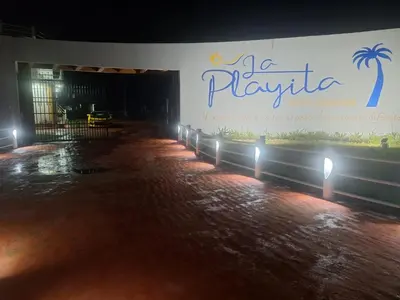 Piscina en o cerca de La Playita