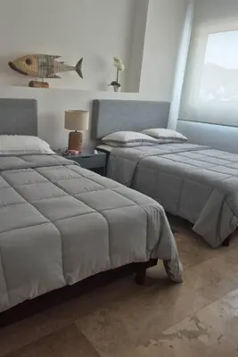 Cama o camas de una habitación en Lujo en el corazón de Acapulco