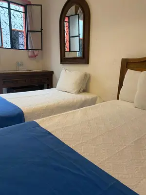 Cama o camas de una habitación en Hotel Nacional