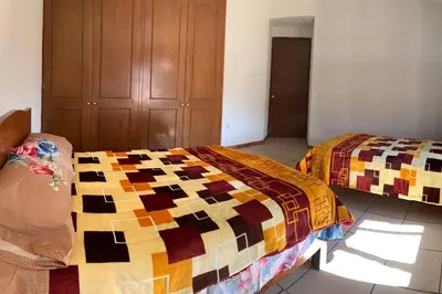 Cama o camas de una habitación en Quinta el mirador