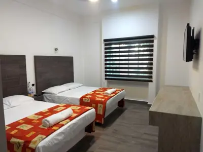 Cama o camas de una habitación en Hotel Galería del Ángel