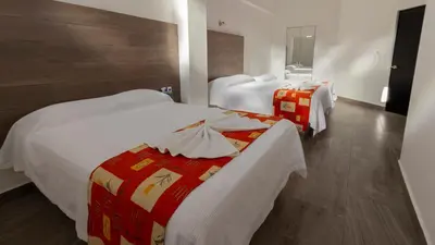 Cama o camas de una habitación en Hotel Galería del Ángel