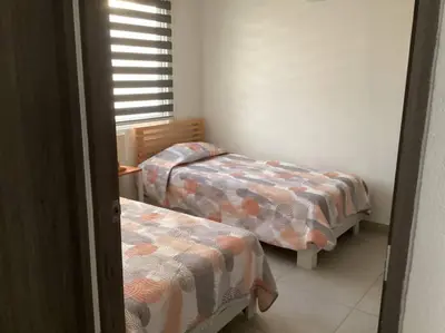 Cama o camas de una habitación en Hermosa casa Acapulco Dream