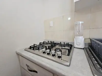 Una cocina o zona de cocina en Sensity home Casa Flores, Hogareña y encantadora