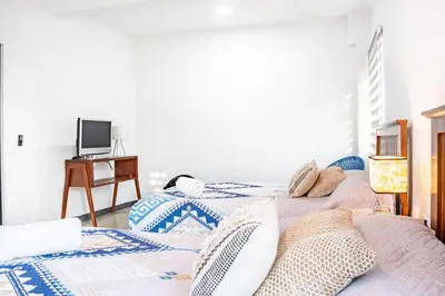 Cama o camas de una habitación en Vida Casa Kuxtal Rooftop con vista al Lago