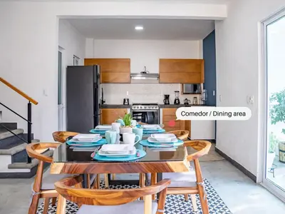 Una cocina o zona de cocina en Vida Casa Kuxtal Rooftop con vista al Lago