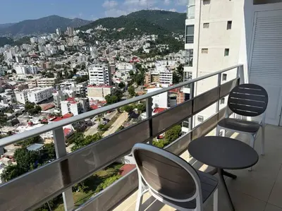 Un balcón o terraza de Departamento con vista a la bahia