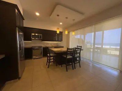 Una cocina o zona de cocina en Beachfront Apartment in Puerto Escondido at Vivo Resort