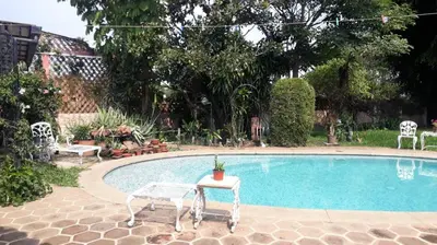 Piscina en o cerca de residencia Casa del Roble 2
