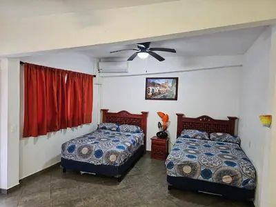 Cama o camas de una habitación en Casablanca Bonfil #1