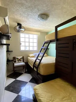 Cama o camas de una habitación en Hermosa Casa en Acapulco Diamante