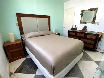 Cama o camas de una habitación en Hermosa Casa en Acapulco Diamante