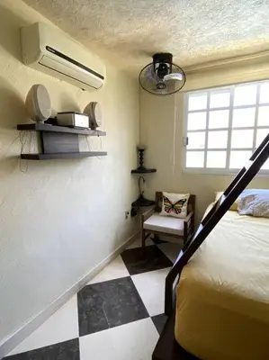 Cama o camas de una habitación en Hermosa Casa en Acapulco Diamante