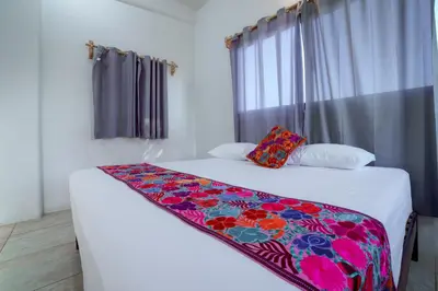 Cama o camas de una habitación en Casa Flores Zicatela