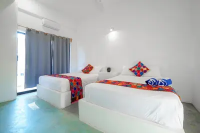 Cama o camas de una habitación en Casa Flores Zicatela