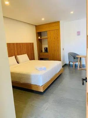 Cama o camas de una habitación en Casa Begonias Hotel mas Villas