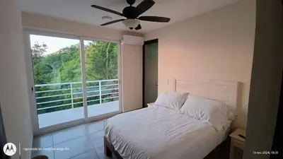 Cama o camas de una habitación en EXCLUSIVE OCEANFRONT Casa Di Luca