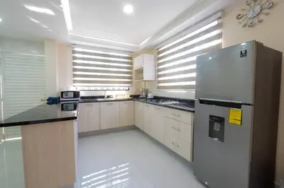 Una cocina o zona de cocina en Departamento a 2 minutos de la playa