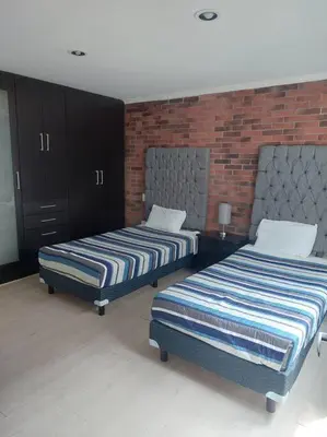Cama o camas de una habitación en Departamento en Cholula Pue La Concordia C4