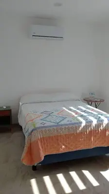Cama o camas de una habitación en Casa Cumbres Tulipanes Descanso Americano