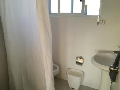 Un baño de Departamento con vista al mar