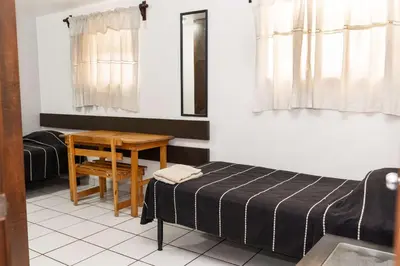 Cama o camas de una habitación en Bohemian Apartment in Oaxaca with 2 Bedrooms