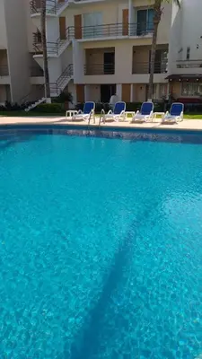 Piscina en o cerca de Hermosa Villa con recamara en PB