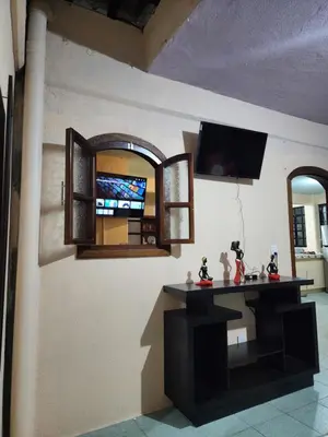 Una televisión o centro de entretenimiento en Casa Gomez